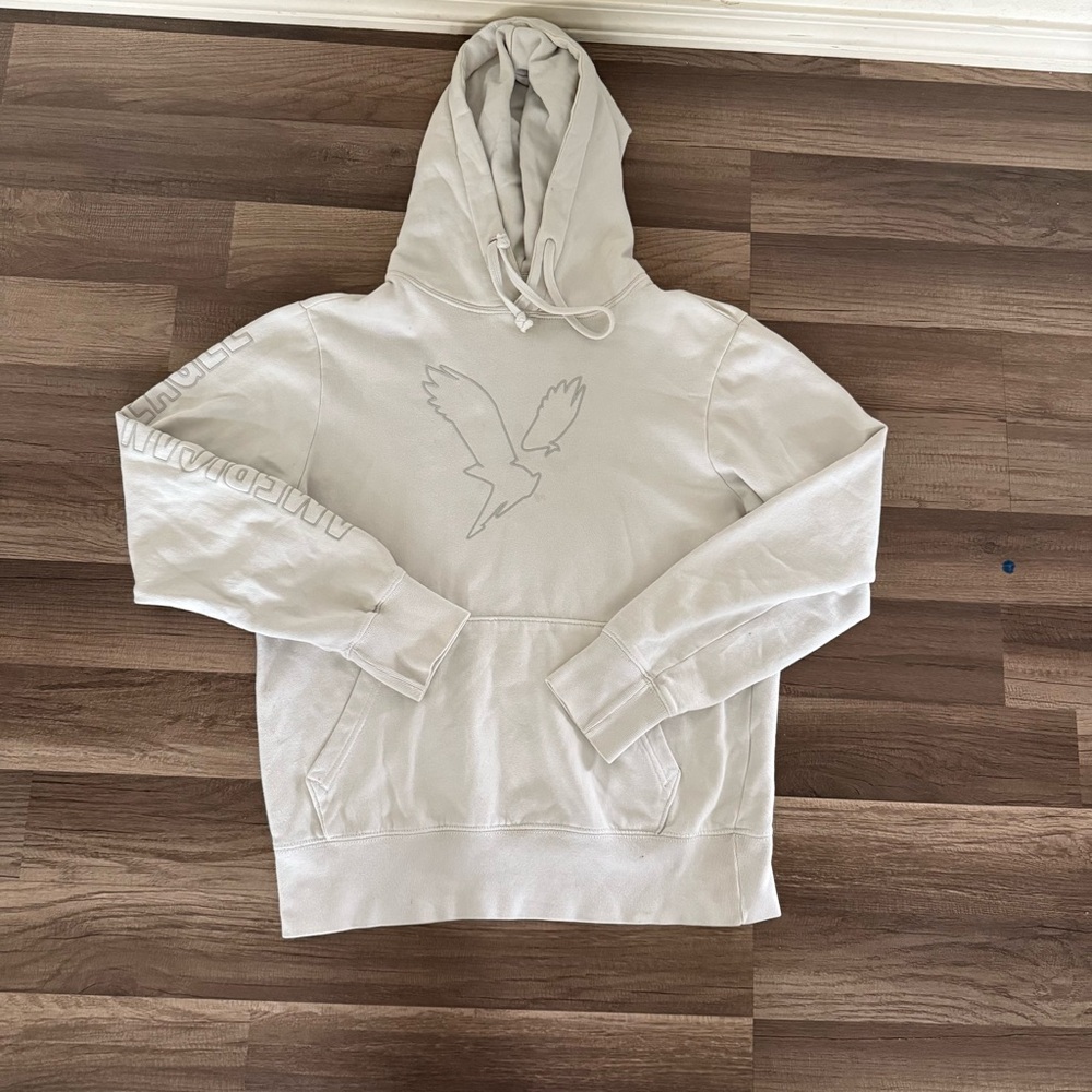 American Eagle Outfitters Cream Hoodie with Eagle Graphic